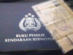 Ilustrasi : Buku BPKB dan STNK Kendaraan Ilustrasi : Buku BPKB dan STNK Kendaraan