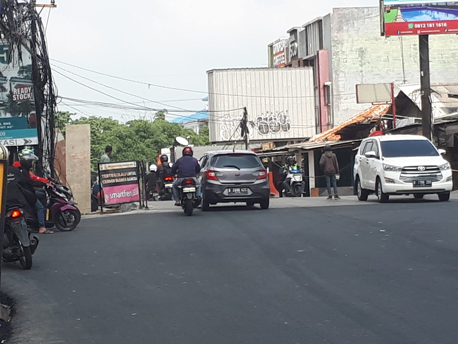 Sistim buka tutup di nonaktifkan, Lalu lintas Prapatan jembatan Mampang Depok sekarang lancar.