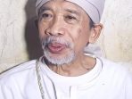 almarhum Qomar