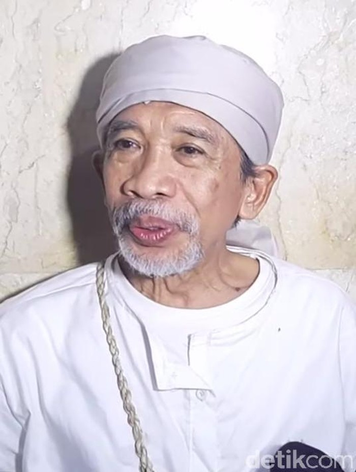 almarhum Qomar